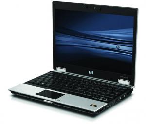 Laptop HP EliteBook 2530p, Core 2 Duo L9400, 1.86Ghz, 2Gb DDR2, 120Gb HDD, DVD-RW, zgarietura inestetica pe carcasa