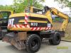 Utilaje constructii: excavator pe pneuri cat m 312