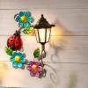 Lampa solara de perete cu felinar si decoratiune