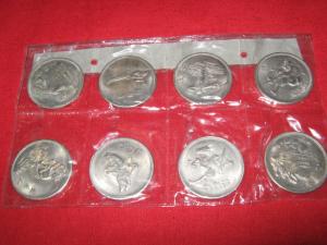 Monezile cu cei opt nemuritori ( din metal - argintate )