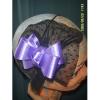 Purple ribbon on black feelings fascinator